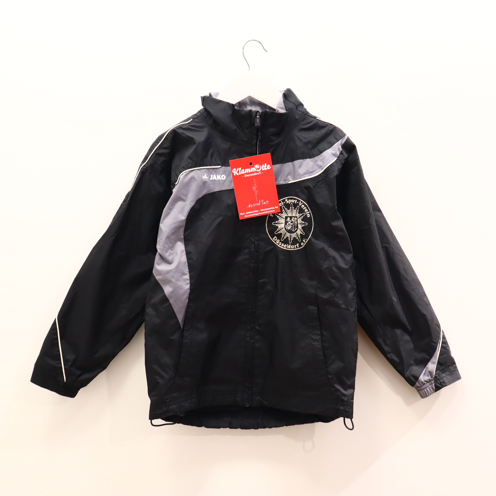 Jacke JAKO 128 schwarz Logo/Print Regenjacke/Sportjacke Meshfutter/versteckte Kapuze