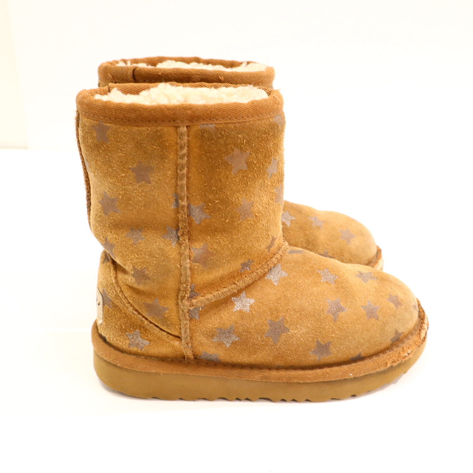 Stiefel UGG 26 braun Lammfell Sterne Boot Herbst/Winter leichter gleichmäßiger Sohlenabrieb/Gebrauchspuren an Kappen